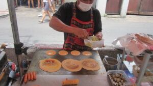 Streetfood in Bangkok. / Street food in Bangkok.